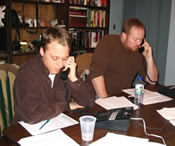 Volunteers work the phones