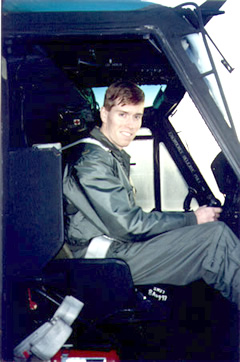 Greg at the controls of a Black Hawk