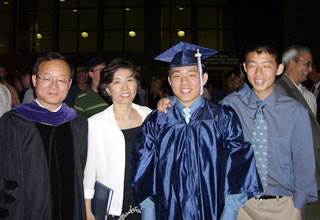 Ilryong with his family at his son's high school graduation
